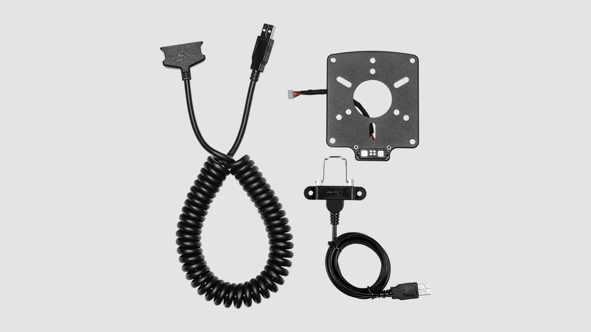 Le MagLink, 19,90 $ chez Simagic : une plaque à aimant et un câble USB, pour emmener un volant Simagic compatible sur la base d'une autre marque. Visuel Simagic.
